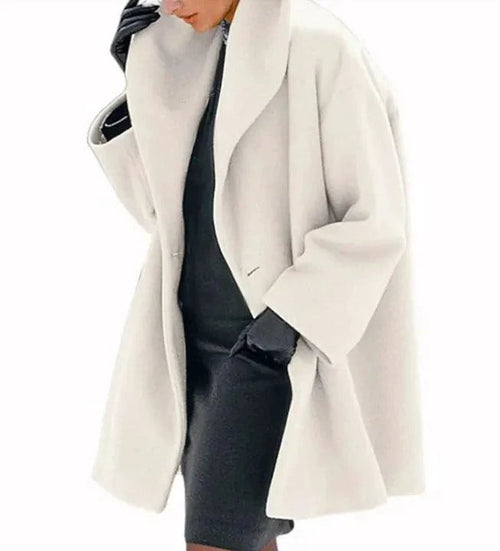 Mandotos chic multi-shade oversized cardigan featuring soft knit fabric and relaxed fit, displayed on a neutral background.