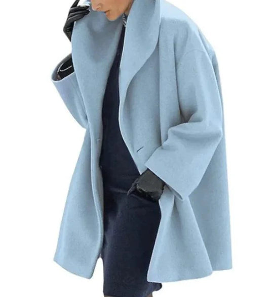 Mandotos oversized cardigan with multi-shade knit, featuring a relaxed fit and cozy design in a stylish, chunky style.