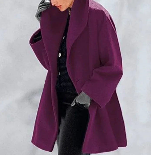 Mandotos oversized cardigan featuring multiple shades of knit fabric in a relaxed, chunky style for casual wear.