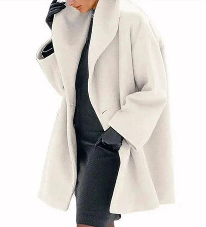 Mandotos chic multi-shade oversized cardigan with a relaxed fit, featuring a soft knit fabric and vibrant color blocks.