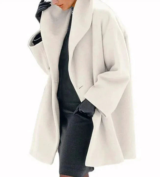 Mandotos chic multi-shade oversized cardigan with a relaxed fit, featuring a soft knit fabric and vibrant color blocks.