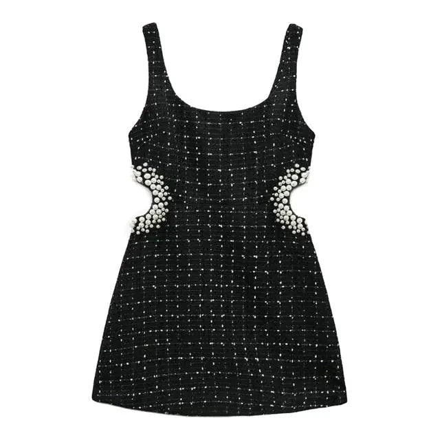 Mandotos chic off-shoulder mini dress featuring a stylish design and fitted silhouette, perfect for summer and special occasions.