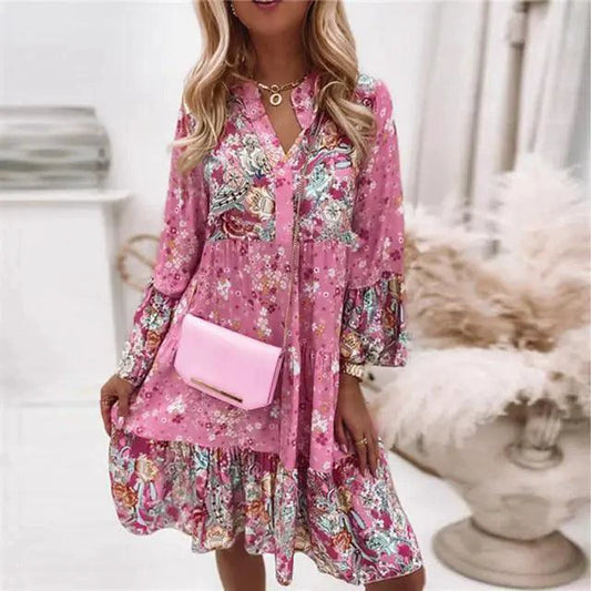 Mandotos chic pleated long sleeve dress featuring a stylish design with flowing fabric and elegant silhouette.