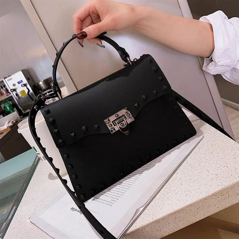 Mandotos chic PU leather sling bag with adjustable strap and stylish design, perfect for casual or evening use.