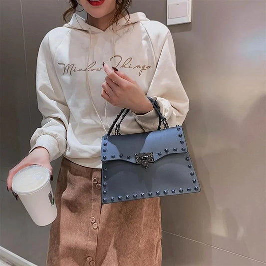 Mandotos chic PU leather sling bag with adjustable strap and stylish design, perfect for casual or evening wear.