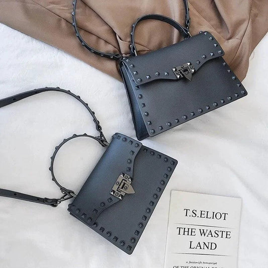 Mandotos chic PU leather sling bag with adjustable strap, compact design, and stylish appearance for casual or evening use.