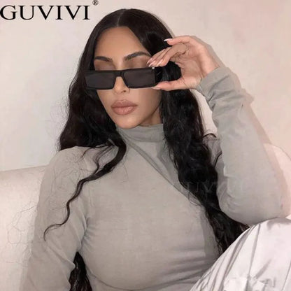 Mandotos chic retro rectangle sunglasses with black frames and dark lenses, stylish accessories for a vintage-inspired look.