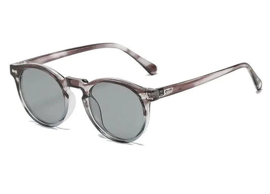 Mandotos chic round UV-block sunglasses with black frames and dark lenses, stylish eyewear for sun protection.