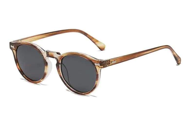 Mandotos chic round UV-block sunglasses with black frames and tinted lenses, stylish and protective eyewear.
