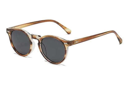 Mandotos chic round UV-block sunglasses with black frames and dark lenses, stylish and protective for sunny days.