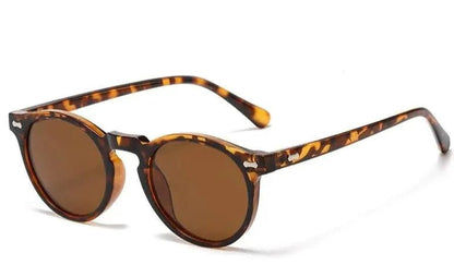 Mandotos chic round UV-block sunglasses with black frames and dark lenses, stylish eyewear for sun protection.