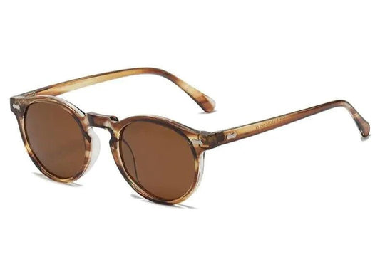 Mandotos chic round UV-block sunglasses with black frames and dark tinted lenses, stylish and protective eyewear for sunny days.