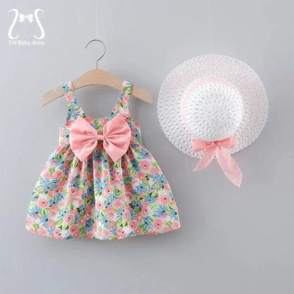 Chic toddler girl summer duo dresses by MANDOTOS featuring colorful, lightweight fabrics and playful designs for warm weather.