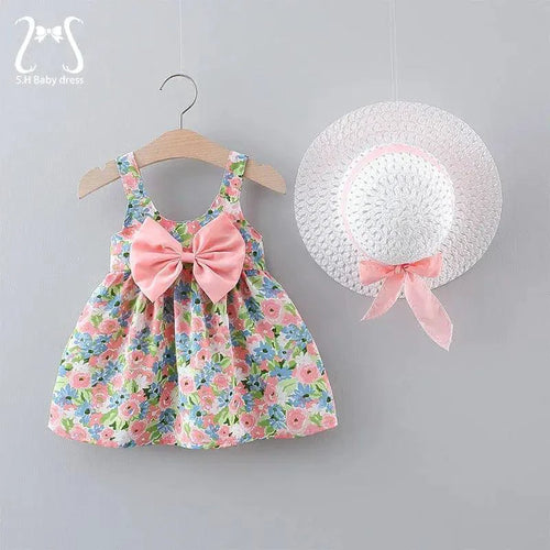 Chic toddler girl summer duo dresses by MANDOTOS featuring colorful, lightweight fabrics and playful designs for warm weather.