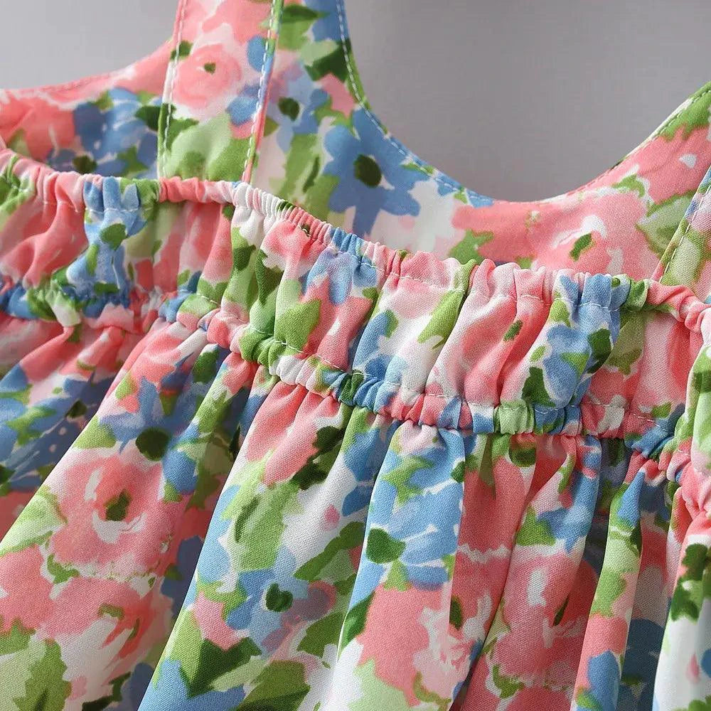Chic toddler girl summer duo dresses by MANDOTOS, featuring colorful patterns and lightweight fabric perfect for warm weather.