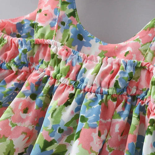 Chic toddler girl summer duo dresses by MANDOTOS, featuring colorful patterns and lightweight fabric perfect for warm weather.