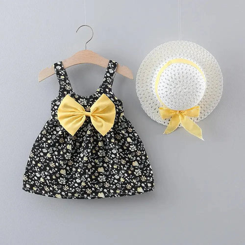 Chic toddler girl summer duo dresses by MANDOTOS, featuring colorful, lightweight cotton dresses with playful patterns.