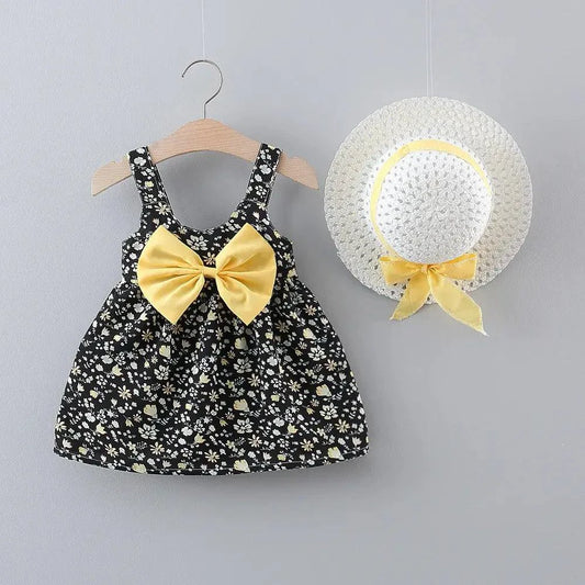 Chic toddler girl summer duo dresses by MANDOTOS, featuring colorful, lightweight cotton dresses with playful patterns.