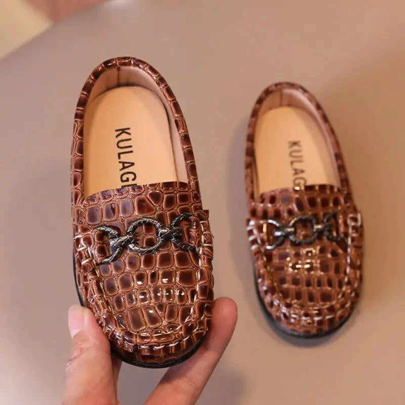 Chic toddler leather shoes by Mandotos featuring soft brown leather, stylish design, and comfortable fit for young children.