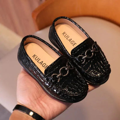 Chic toddler leather kicks by MANDOTOS featuring stylish design and soft leather material for young children.