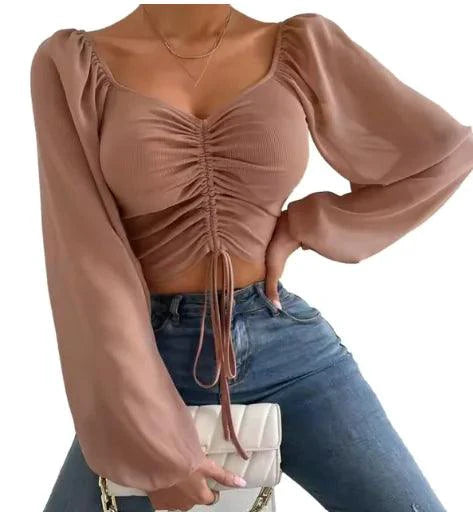 Mandotos chic V-neck crop top with balloon sleeves, stylish and trendy fashion top for casual or dressy occasions.