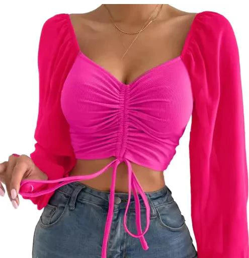 Mandotos chic V-neck crop top with balloon sleeves, featuring a stylish and trendy design perfect for casual or dressy outfits.