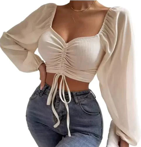 Mandotos chic V-neck balloon sleeve crop top featuring a stylish design and trendy fit, perfect for casual or dressy outfits.
