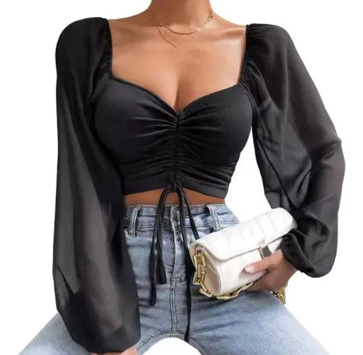 Mandotos chic V-neck balloon sleeve crop top displayed on a hanger, showcasing stylish design and vibrant fabric.