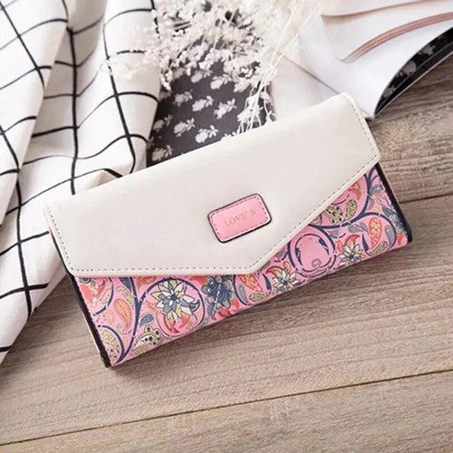Mandotos women's leather clutch wallet and card holder with sleek design and multiple card slots, suitable for elegant everyday use.