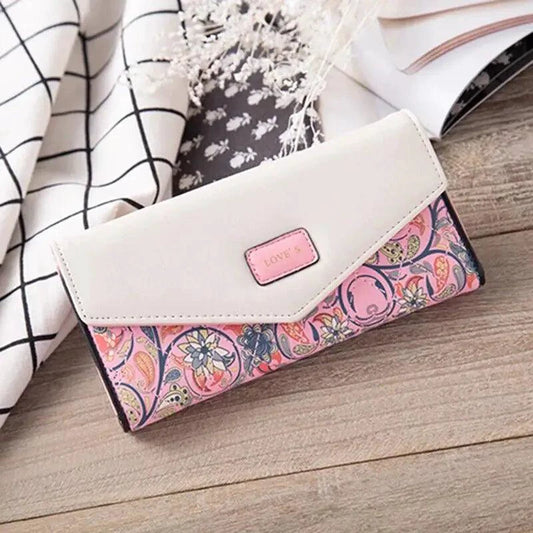 Mandotos women's leather clutch wallet and card holder with sleek design and multiple card slots, suitable for elegant everyday use.
