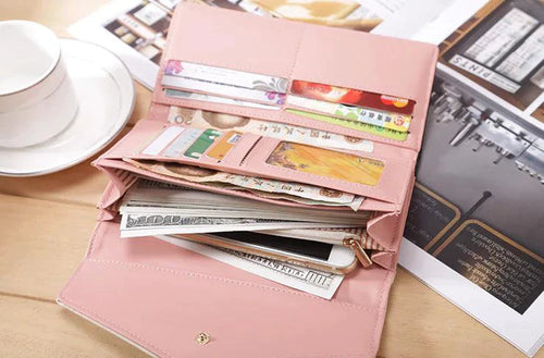 Mandotos chic women's leather clutch wallet and card holder with elegant design and compact size for daily essentials.