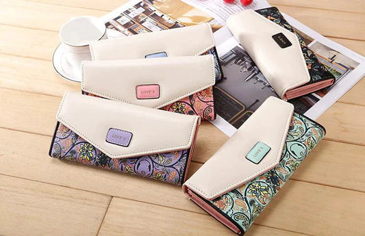 Mandotos women's leather clutch wallet and card holder, stylish compact accessory with multiple card slots and a sleek design.