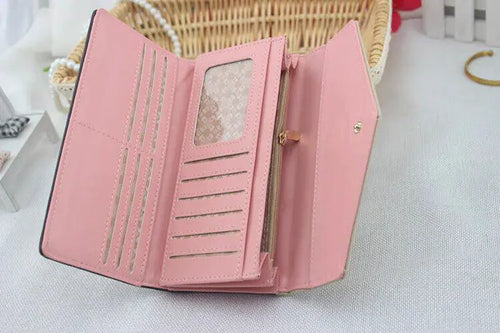 Mandotos women's leather clutch wallet and card holder showing a sleek black design with multiple card slots and a zippered compartment.