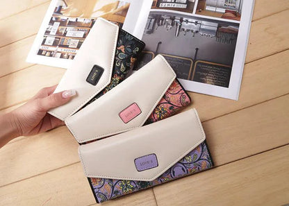 Mandotos chic women's leather clutch wallet and card holder with sleek design and compact storage for cards and cash.