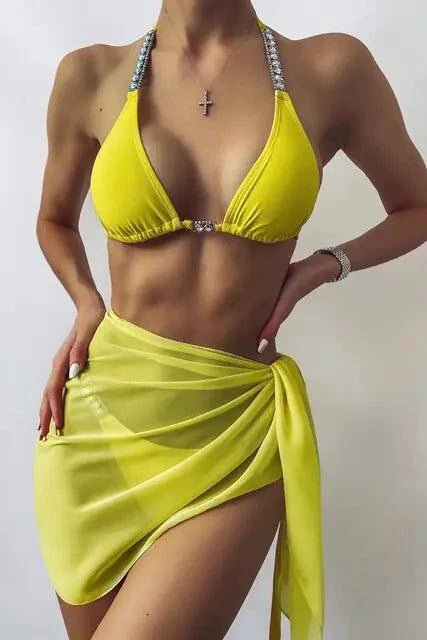 Mandotos ChicWave elegant chiffon sarong draped over a model, showcasing lightweight, flowing beachwear for stylish seaside outings.