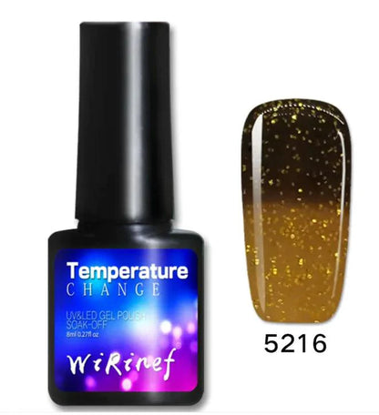 Mandotos Chromatic Nail Adhesive bottle with applicator tip, clear adhesive for professional nail enhancements and repairs.