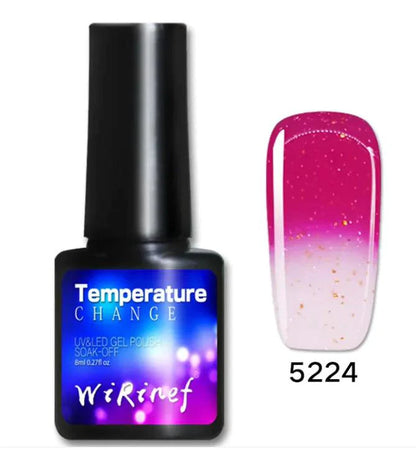 Mandotos Chromatic Nail Adhesive bottle with applicator brush, designed for durable nail art and false nail application.