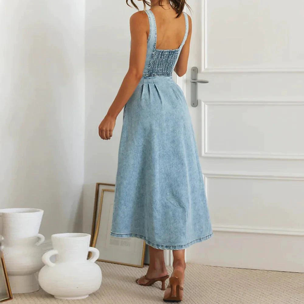 Mandotos CitySleek denim midi dress featuring a fitted silhouette and classic blue denim fabric.