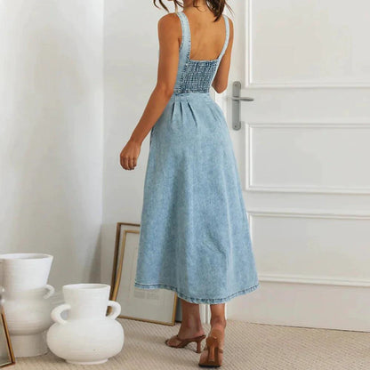 Mandotos CitySleek denim midi dress featuring a fitted silhouette and classic denim fabric, displayed on a hanger.