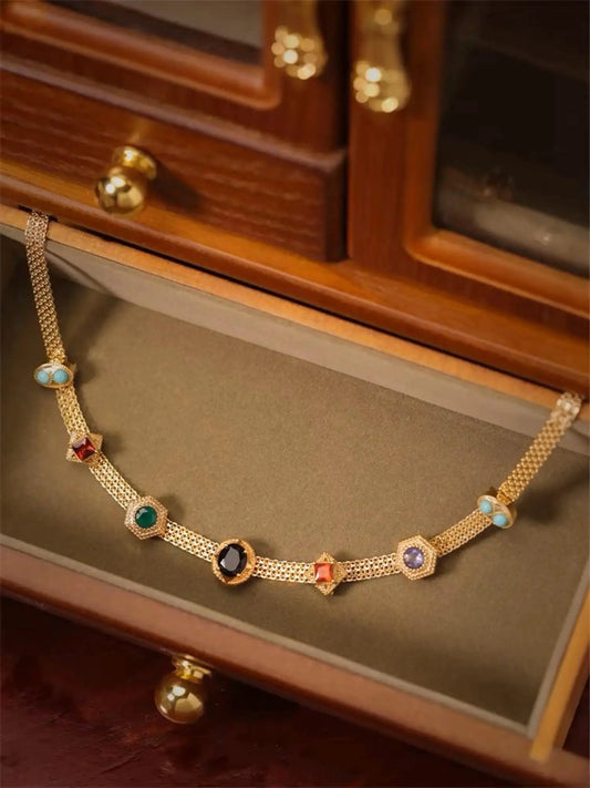 Vintage 14K gold choker necklace from MANDOTOS featuring a classic design with a polished finish.