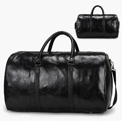 Mandotos classic leather duffel bag with sturdy handles and spacious interior, ideal for travel and weekend trips.