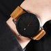 Mandotos Classic Leather Timepiece featuring a sleek leather strap and round watch face with minimalist design.