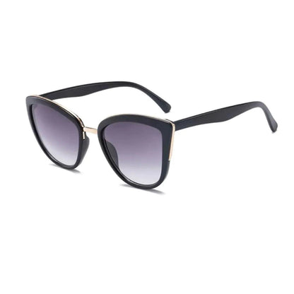 Mandotos Cleo Cat Eye Shades with black frames and tinted lenses, stylish eyewear for a fashionable look.