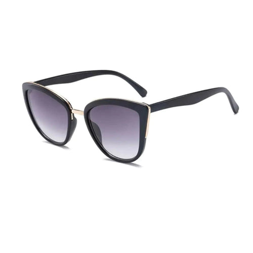 Mandotos Cleo Cat Eye Shades with black frames and tinted lenses, stylish eyewear for a fashionable look.