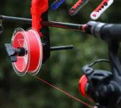 Mandotos compact fishing line spooler with adjustable spool holder and easy-to-use crank for efficient line winding.