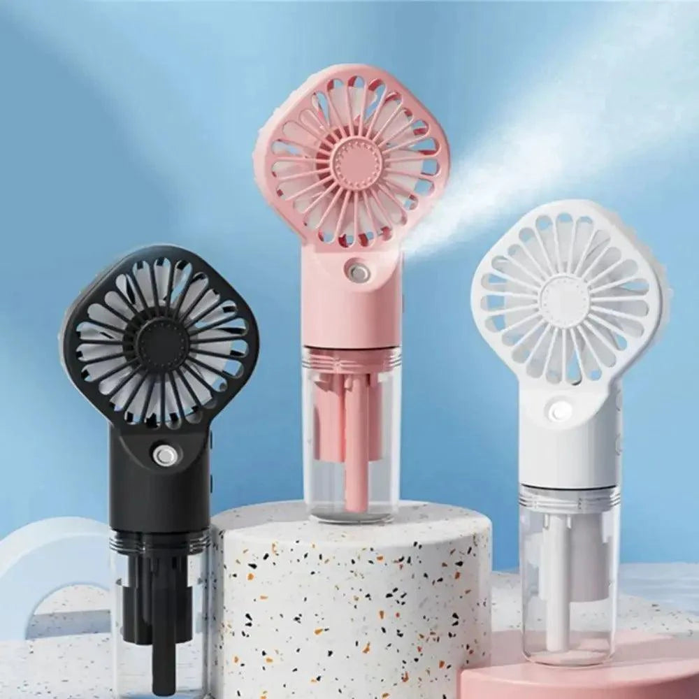 Mandotos compact hydrating mist fan with adjustable nozzle and ergonomic handle, delivering cooling mist for outdoor use