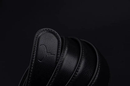 Mandotos contemporary leather belt featuring a sleek design, brown leather strap, and metal buckle for modern style and durability.