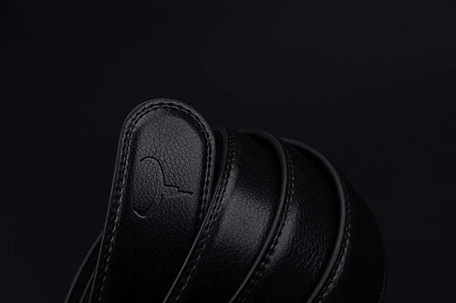 Mandotos contemporary leather belt featuring a sleek design, brown leather strap, and metal buckle for modern style and durability.