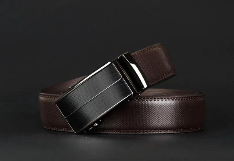 Contemporary MANDOTOS leather belt with sleek design and metal buckle, displayed on a neutral background.