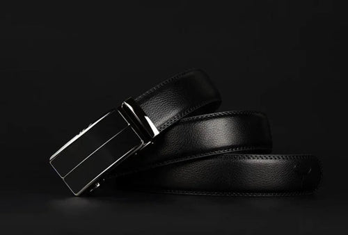 Contemporary MANDOTOS leather belt with sleek design and polished finish, shown in close-up view.